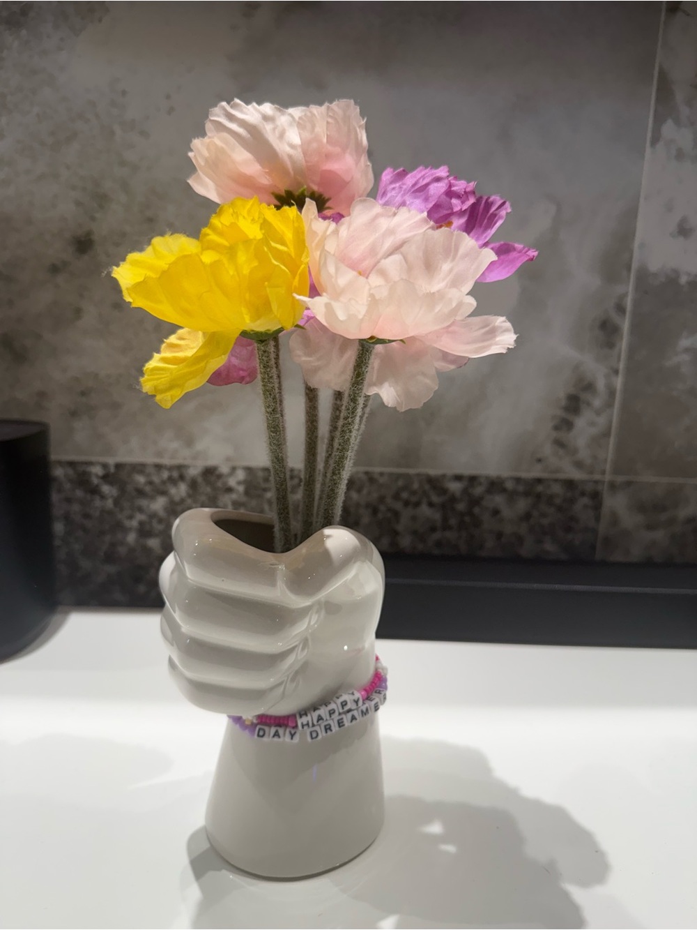 White ceramic fist vase with faux flowers & Happy Dreamer bracelet - pre owned